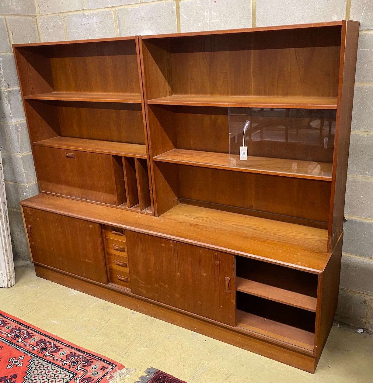 A mid century Clausen teak side cabinet, length 209cm, depth 44cm, height 164cm